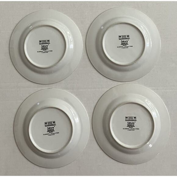 Sakura Debbie Mumm 4 Stoneware 8” Salad Dessert Plates Sledding Characters NOB - Picture 8 of 11